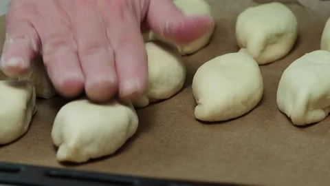 Pies on a baking tray. Stock Footage 229688542