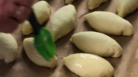 Pies on a baking tray. Stock Footage 229757528