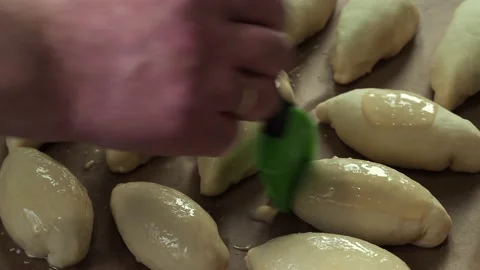 Pies on a baking tray. Stock Footage 229757530