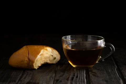Pies with a cup of tea on the table. Stock Photos