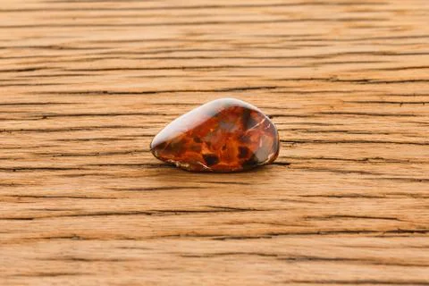 Pietersite on oak surface Stock Photos