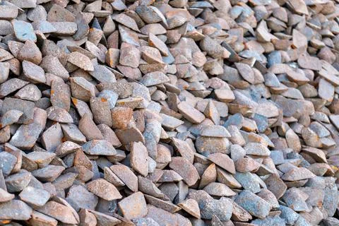 Pig iron ingots piled creating abstract textured surface Stock Photos