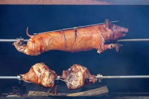 Pig roasted on a spit Stock-Fotos
