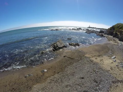 Pigeon Point, CA Beach with Lighthouse in background Stock Photos
