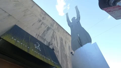 PIGEONS FLYING AROUND AWNING Video stock 104839100