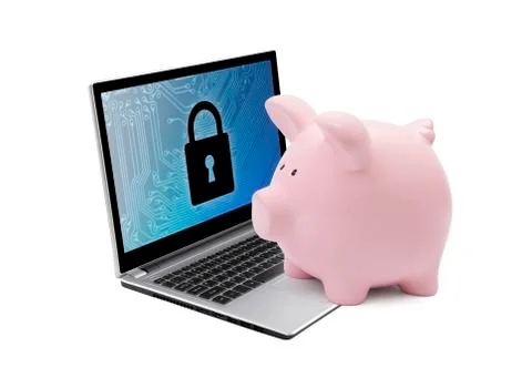 Piggy bank with computer security system on laptop. Banking protection. Stock-Fotos