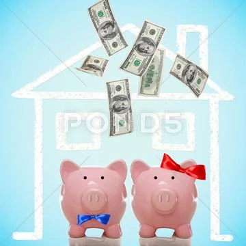 Piggy bank couple buying their dream home Stock Photos