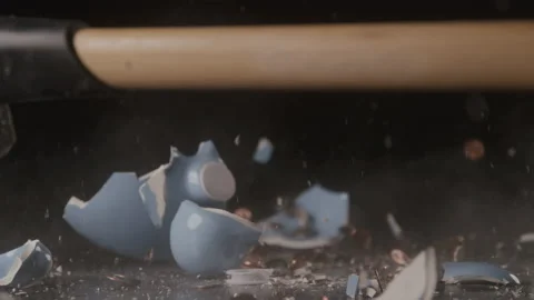Piggy Bank Exploding on Hammer Impact Stock Footage 208801501