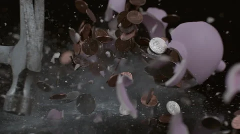 Piggy bank is hit with hammer in slow motion; shot on Phantom Flex 4K at 1000 Stock Footage