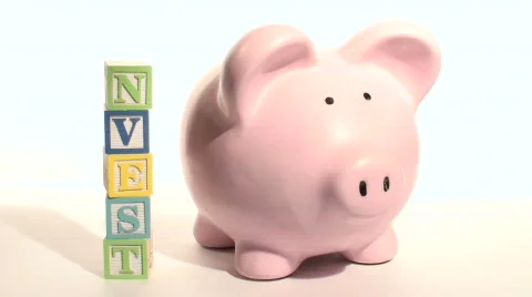 Piggy bank INVEST - HD Stock Footage