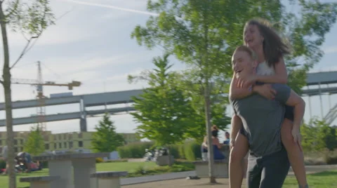 Piggyback ride fun Stock Footage 53632213