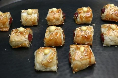 Pigs in a blanket appetizers Stock Photos