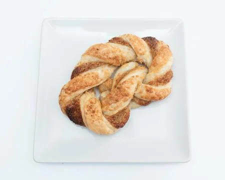 Pigtail bun on a white background. Foto stock
