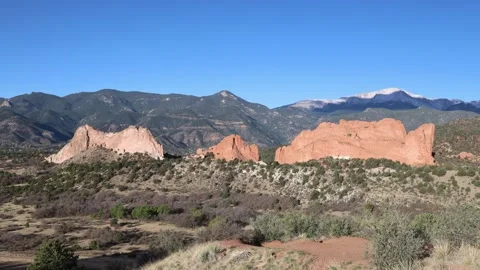 Pikes Peak and Rock Formations at Sunrise Stock Footage 338204476
