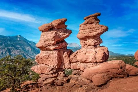Pikes peak behind the Siamese Twins Rock in the Garden of the Gods, Colorado Stock Photos
