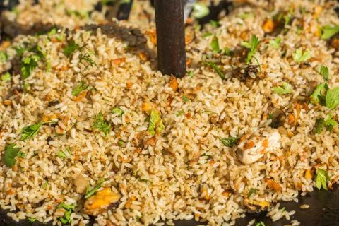 Pilaf in a cauldron. Stock Photos