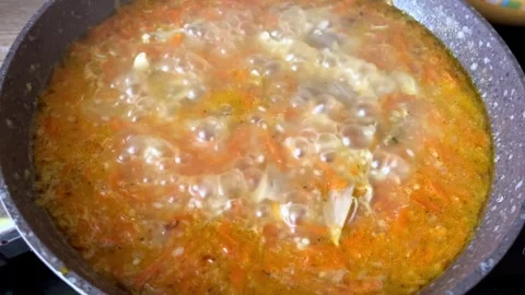 Pilaf with chicken in the process of cooking. Rise with chicken. Stock Footage 267673975