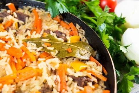 Pilaf on the dining table Stock Photos