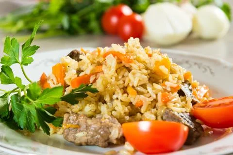 Pilaf on the dining table Stock Photos