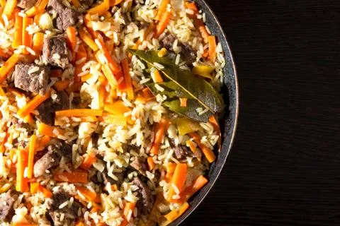 Pilaf on the dining table Stock Photos