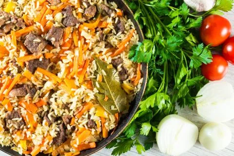 Pilaf on the dining table Stock Photos