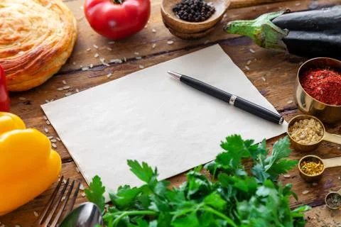 Pilaf ingredients on rustic surface with space for your recipe on paper Foto stock