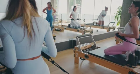 Pilates Class in a Modern Studio Setting 스톡 동영상 323378570