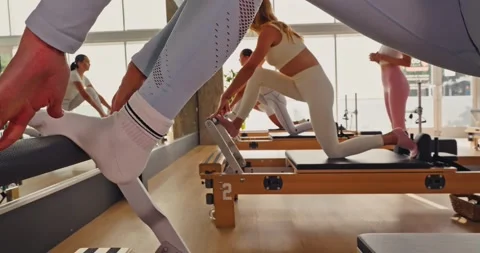 Pilates Stretching Exercise in Modern Studio 스톡 동영상 323946324