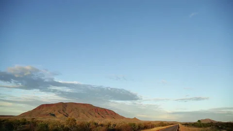 Pilbara pan from long road to mountain Stock Footage 197601896