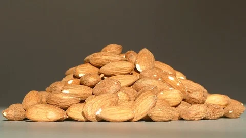 Pile of almonds rotating Video stock 72841826