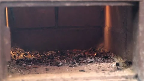 A pile of ash in a blew Stock Footage 153873288