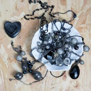 Pile of assorted black chains with shiny box chains, Stock Photos