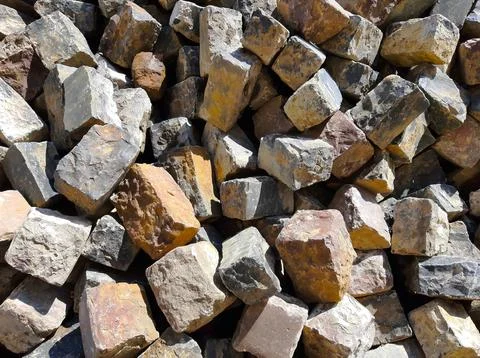 Pile of Assorted Bricks Showing Varied Textures in Natural Light at a Const.. Stock Photos
