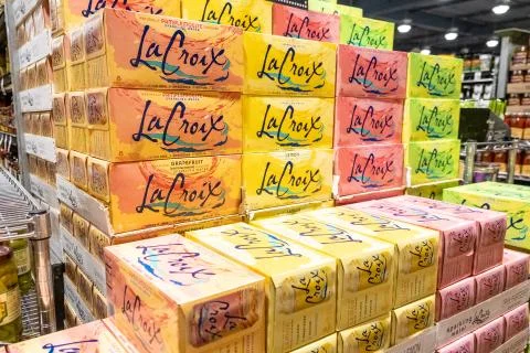 Pile of assorted cases of La Croix brand fruit flavored sparkling water Stock Photos