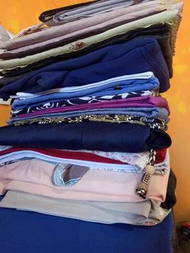 A Pile of Assorted Folded Clothes Stock Photos