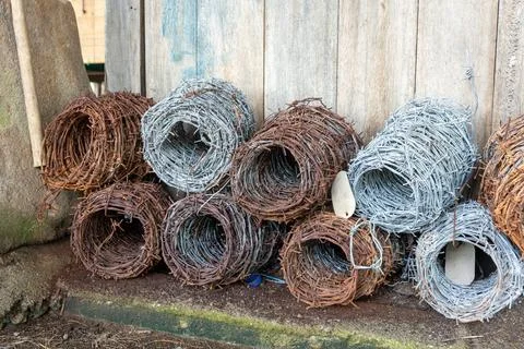 Pile of barbed wire is stacked on top of each other Stock Photos