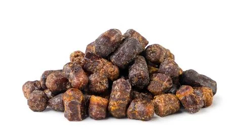Pile of bee bread granules close-up on a white background. Isolated Stock Photos