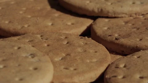 Pile of biscuits background rotating macro. Unhealthy eating. Stock Footage 285926157