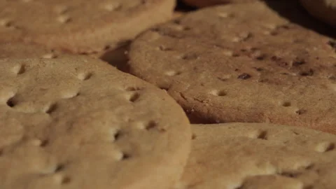 Pile of biscuits background rotating macro. Unhealthy eating. Stock Footage 285926158