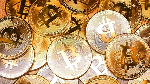 Pile of bitcoins being lighted up in dark Stock Footage 146297968