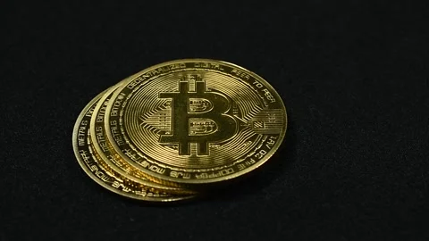 Pile of Bitcoins on Black Background Stock Footage 335990877