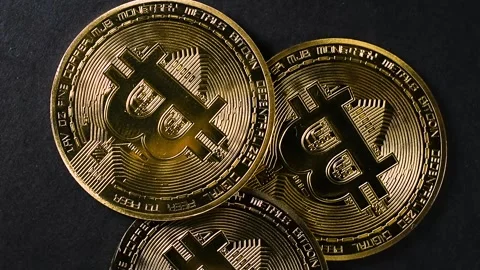Pile of Bitcoins on Black Stock Footage 336362134