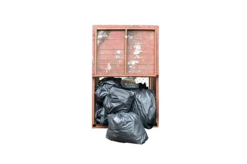 Pile of black garbage in a bin isolated on white background. Pile of garbage  Stock Photos