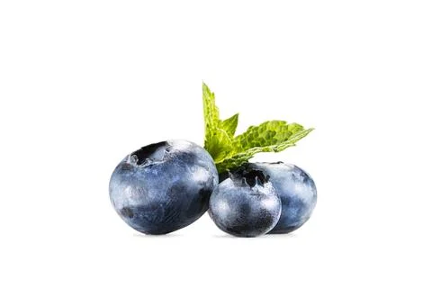 Pile of blueberries with mint Stock Photos