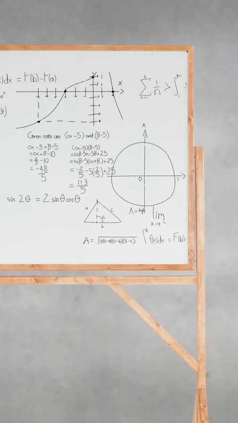 Pile of books and mathematical equations and graphs written in a white board Video stock 342098010