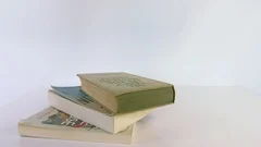 hand opening book on white background, Stock Video