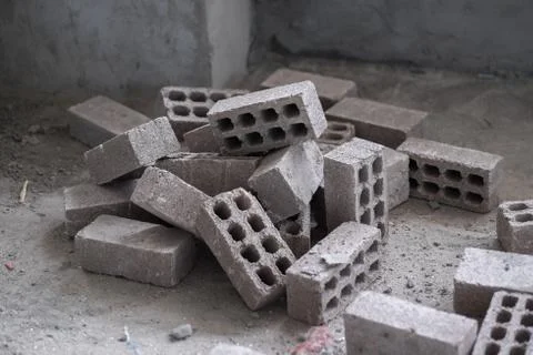 Pile of Bricks on Floor made of Cinderblock Cement Foto stock