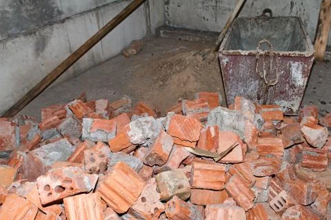 Pile of Bricks by an Old Brick Wall taken by an old building in St. Petersburg Stock Photos