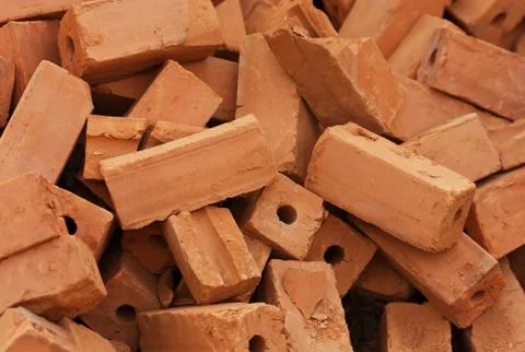 A pile of bricks from red clay Foto stock