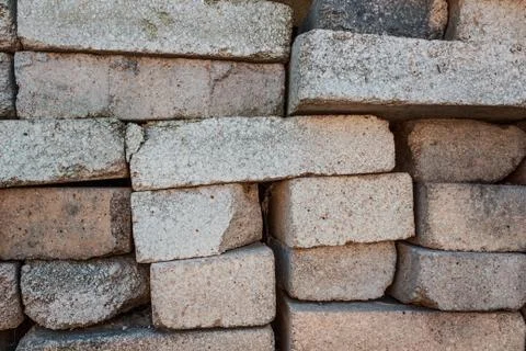 A pile of bricks. Warehouse building materials. Stock Photos